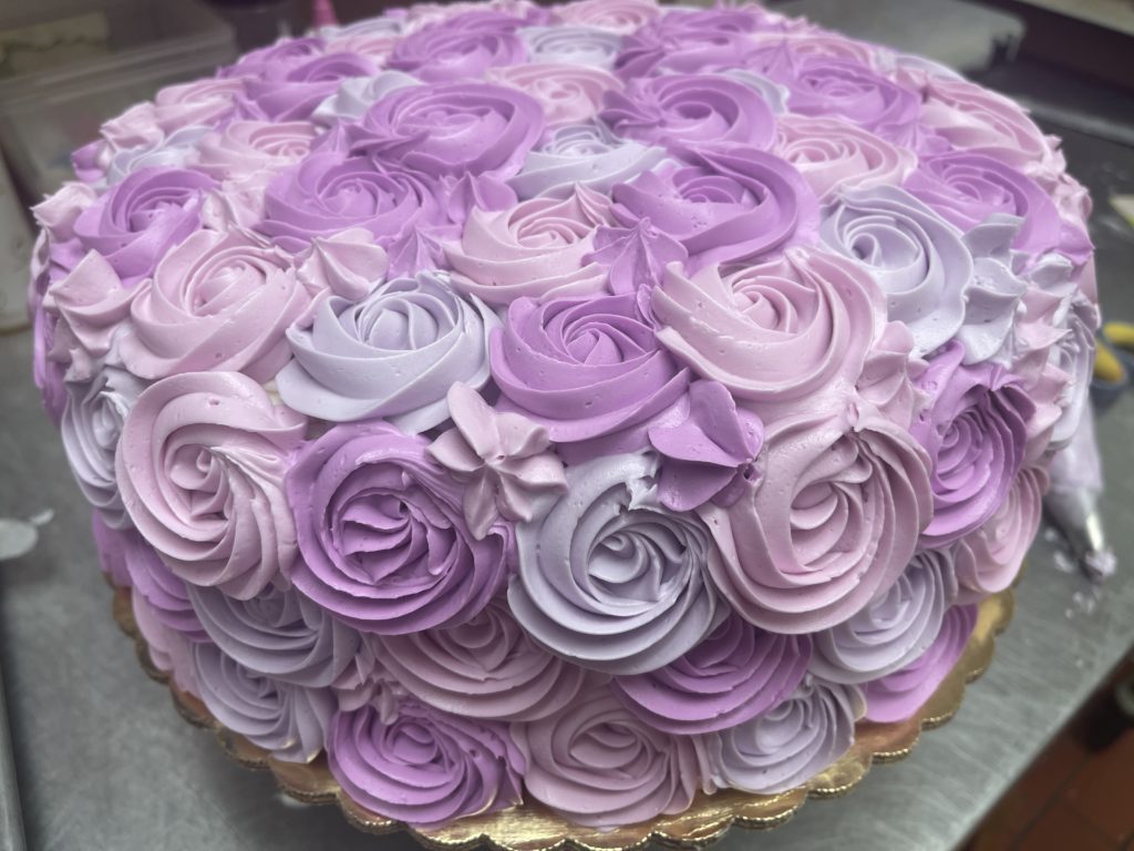 Pink and purple flower swirl cake