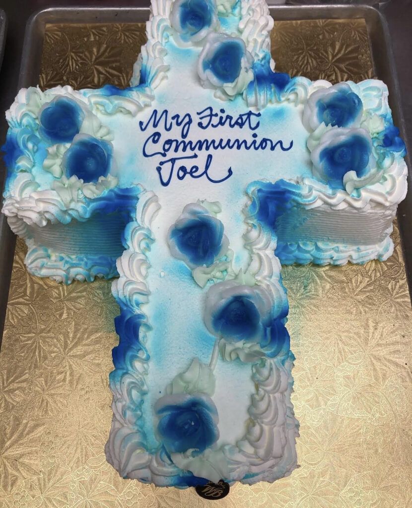 White and blue communion cake