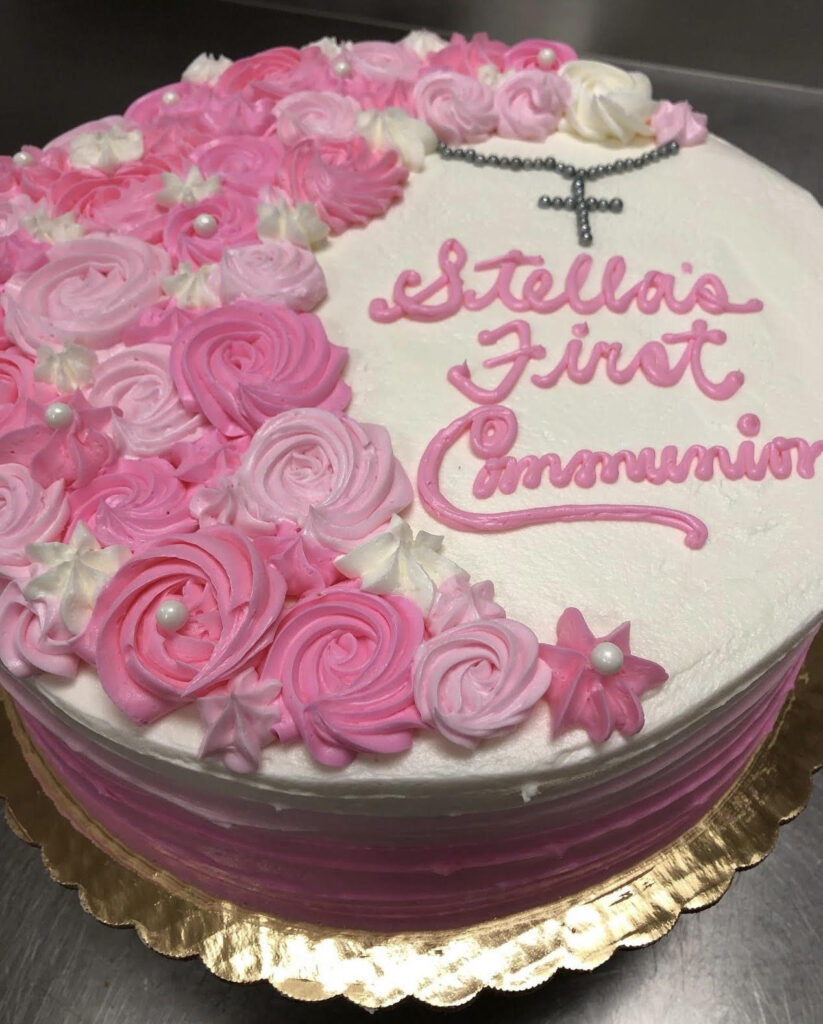 White and pink first communion cake