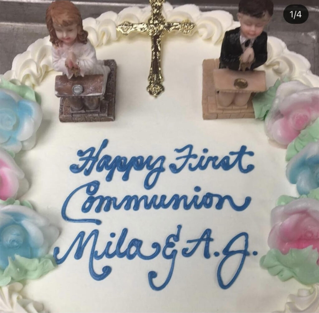 communion cake with boy and girl figurines